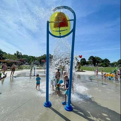 Kids under the splash bucket