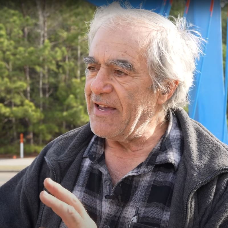 Hanna Jubran stands in front of sculpture